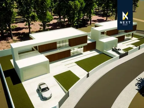 Moradia Bifamiliar T4 de Design Distinto com Terraço Exclusivo e Jardim Vertical